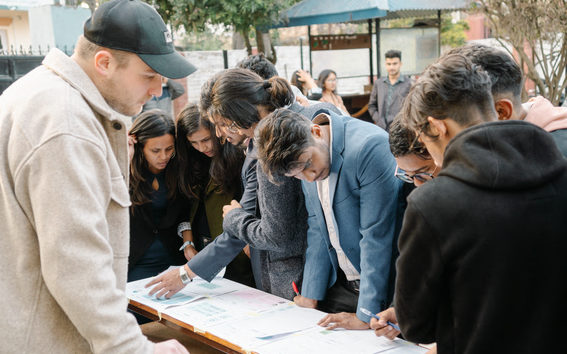 Students doing course work on a study trip.