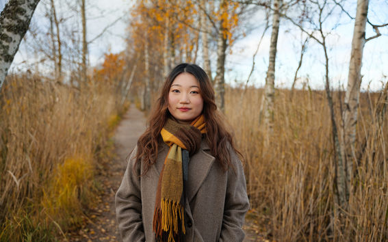 Yijuan on the path to the Laajalahti nature reserve in Otaniemi.