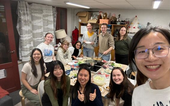 11 students making food together