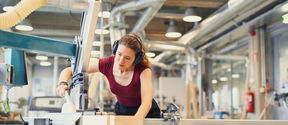 A young woman working in a workshop 