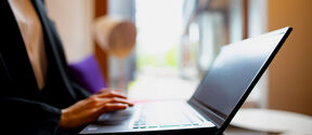 A woman using a laptop