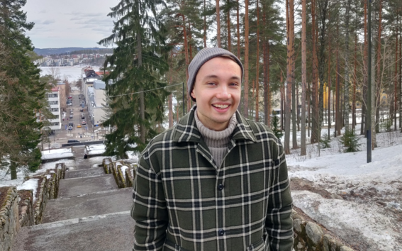 The author Tommi smiling in wintery Jyväskylä