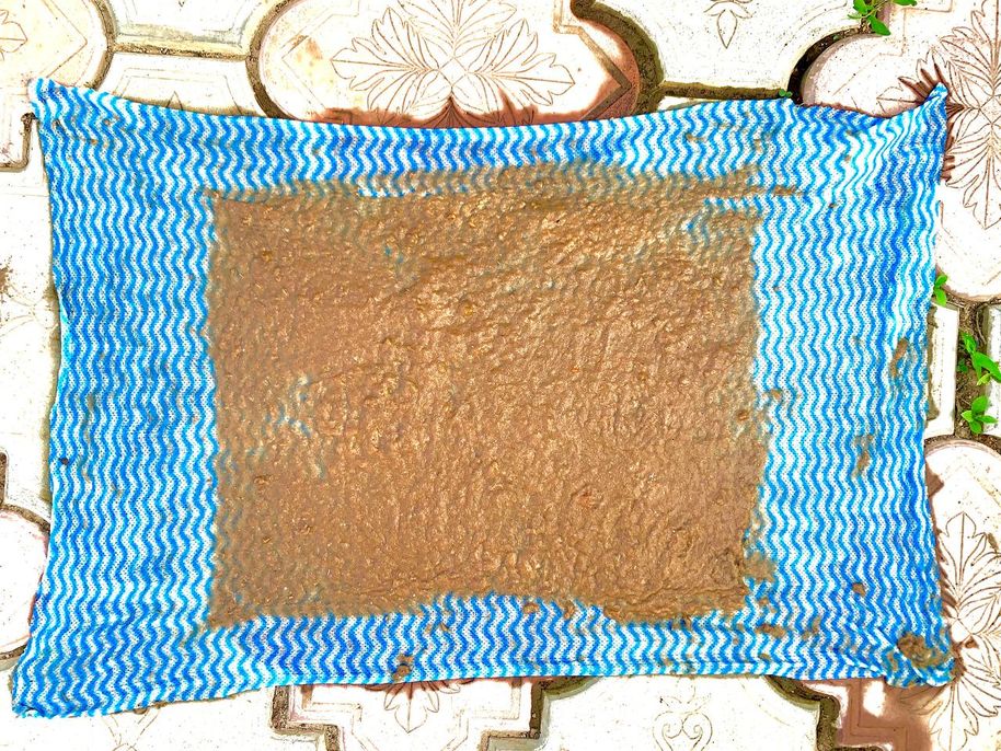 Bio-based material drying on a fabric piece